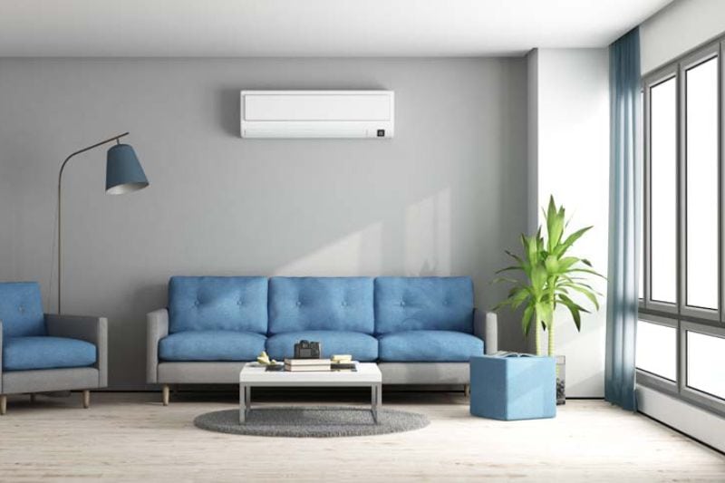 Image of ductless system above couch. Ductless Mini Splits for Comfortable and Healthy Living.